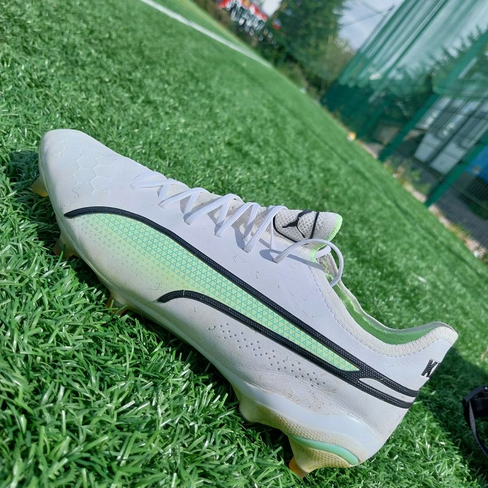 Puma King Ultimate 42 koon nappikset