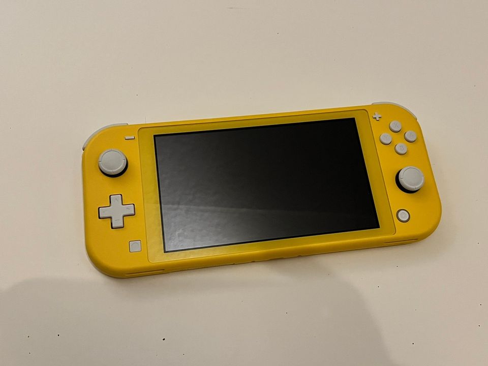 Nintendo Switch Lite ja kantokotelo