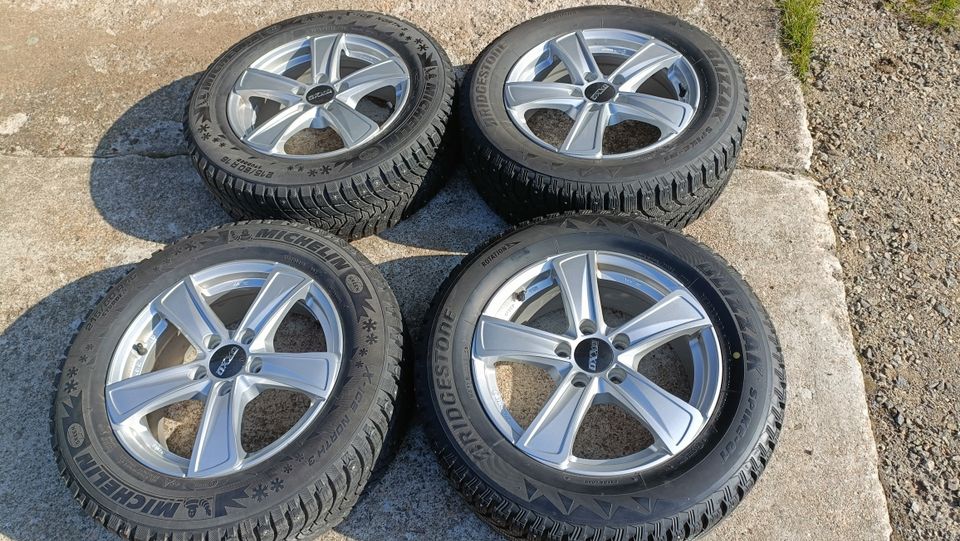 215/60 R16 Nastarenkaat alumiinivanteilla 5x112 jaolla