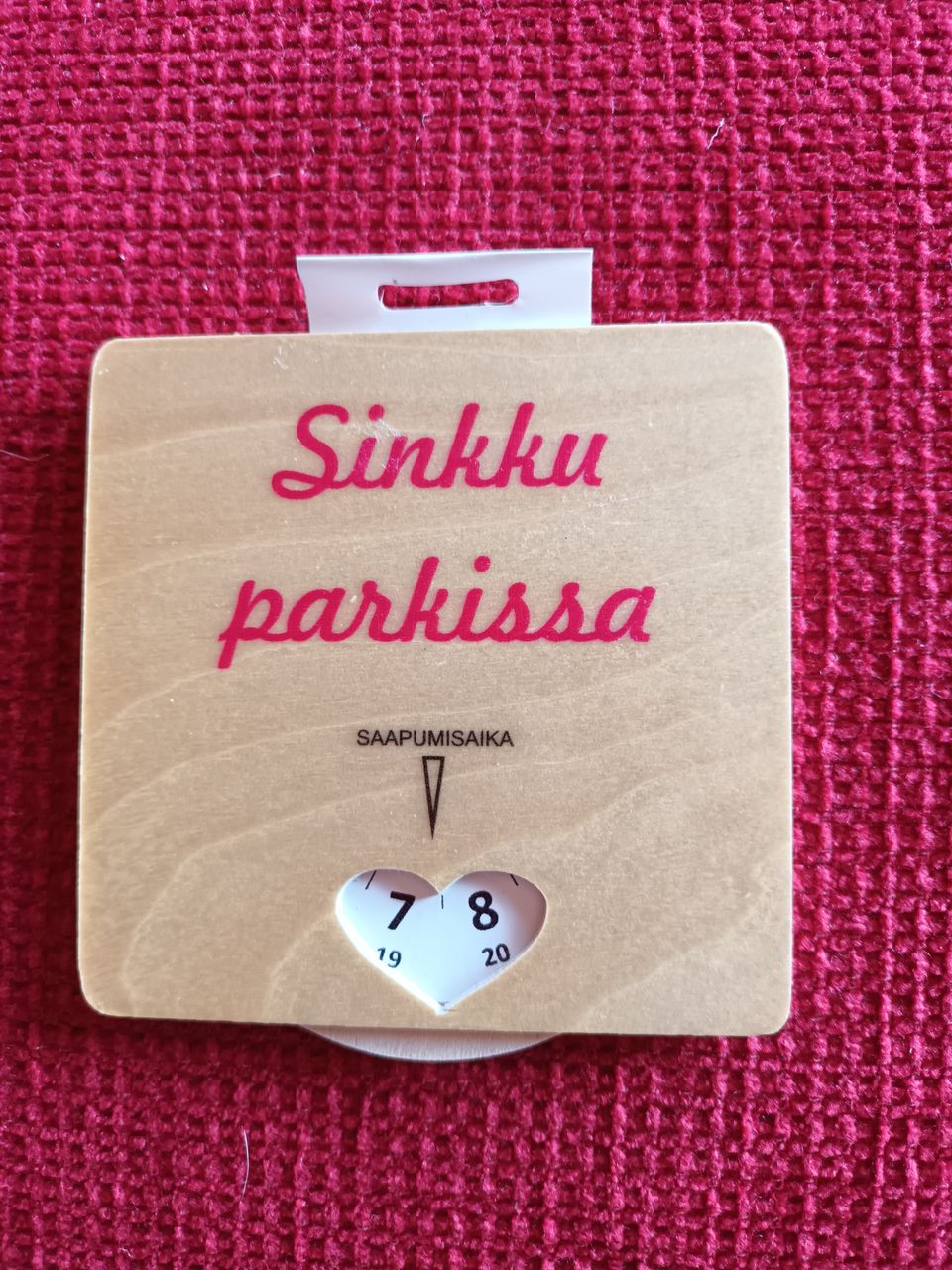 Sinkku parkissa- pysäköintikiekko