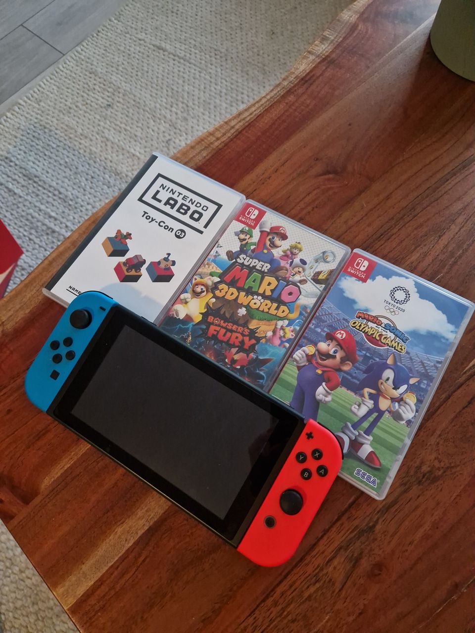 Nintendo Switch + pelejä + lisätarvikkeita