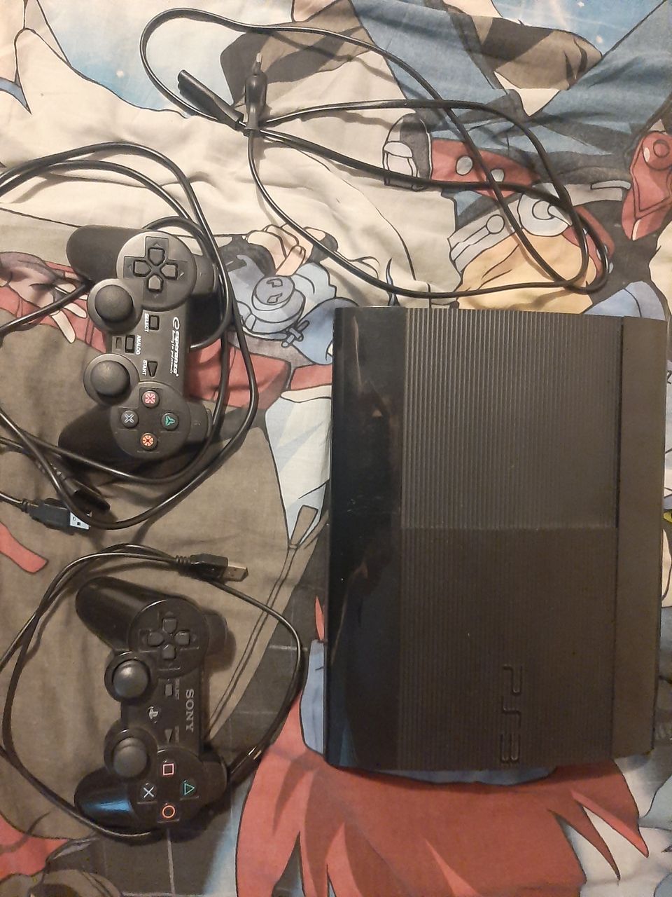 Playstation 3 konsoli,ohjain ja pelit