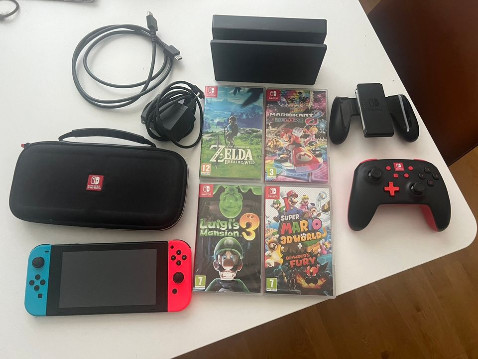 Nintendo Switch + tarvikkeet ja muutama peli