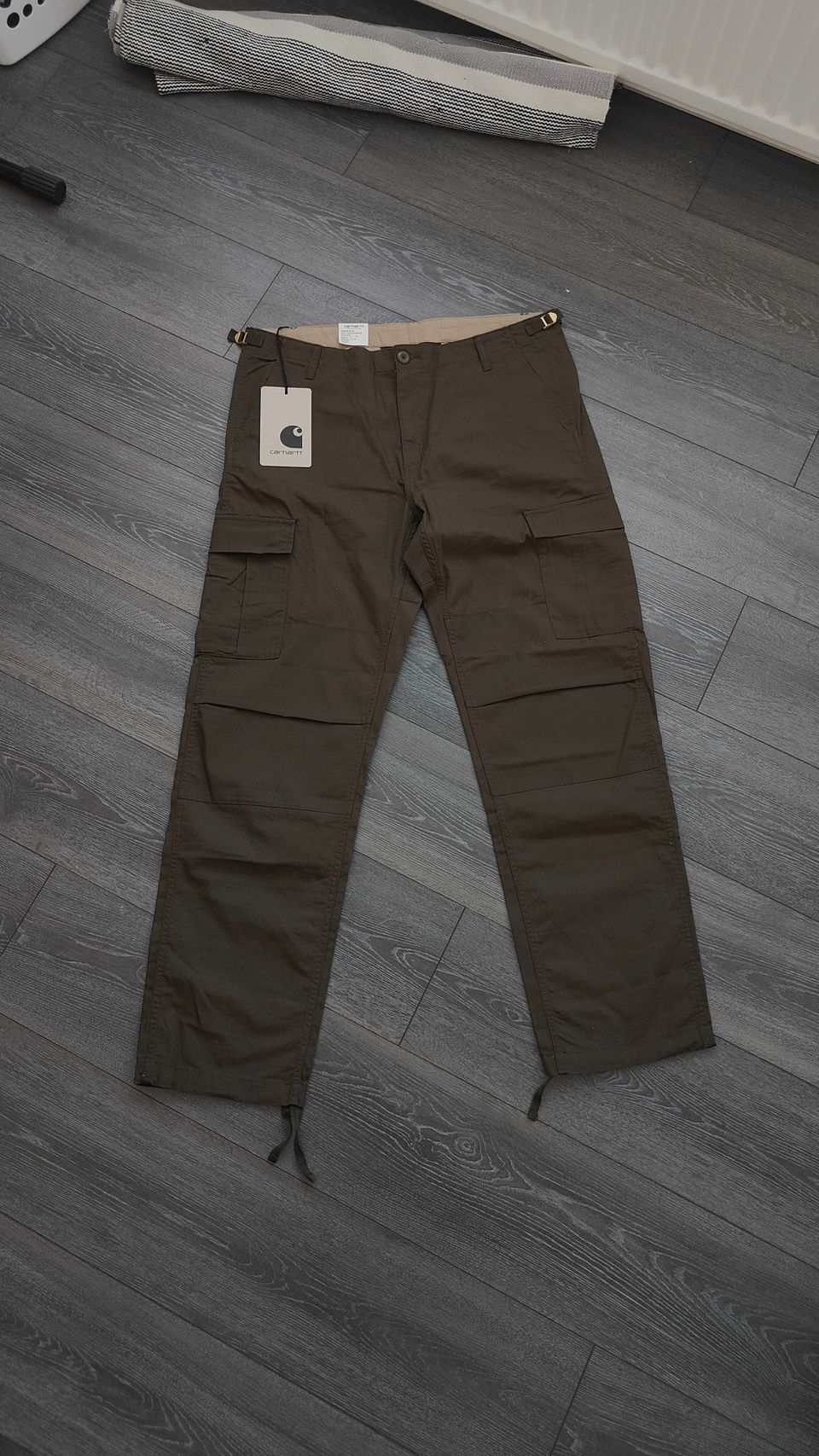 Uudet W33/L32 Carhartt aviation pant