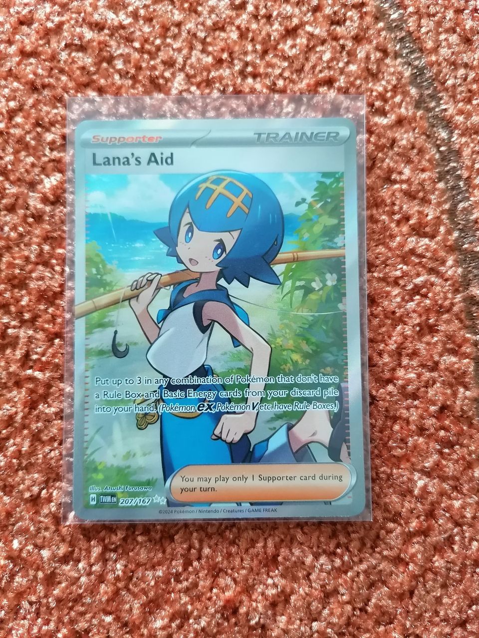 Lana's Aid (Twilight Masquerade) Pokemon-kortti