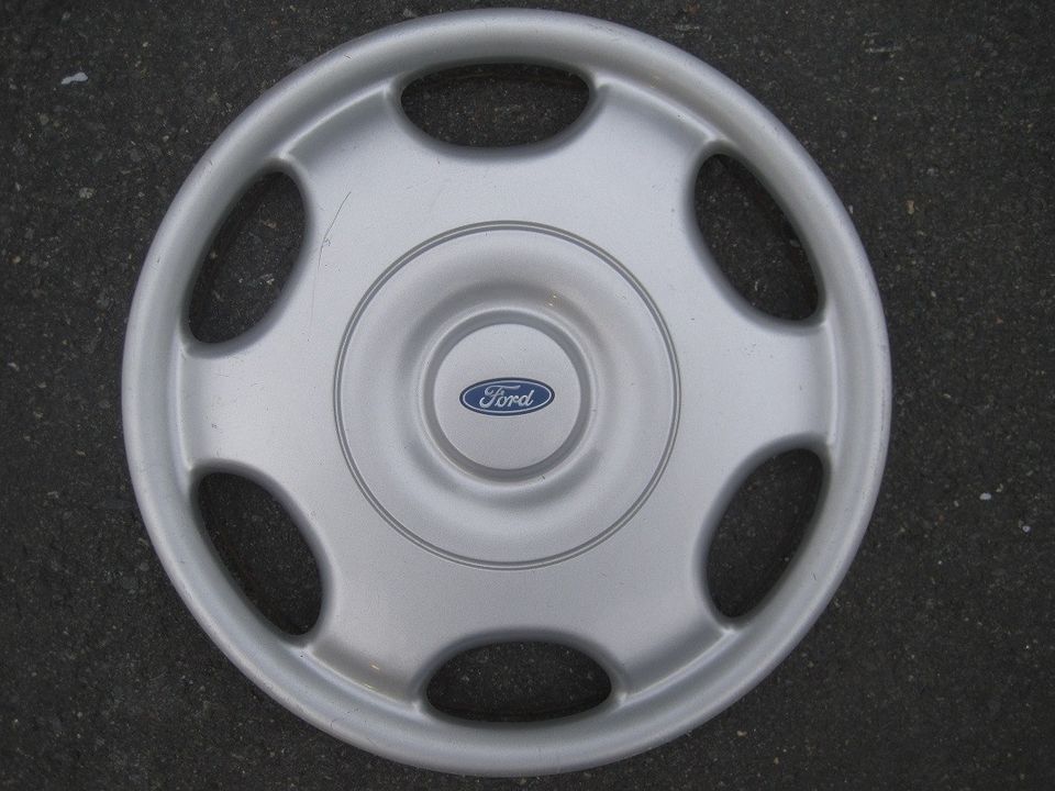 Ford alkuperäiset pölykapselit 15" 4kpl