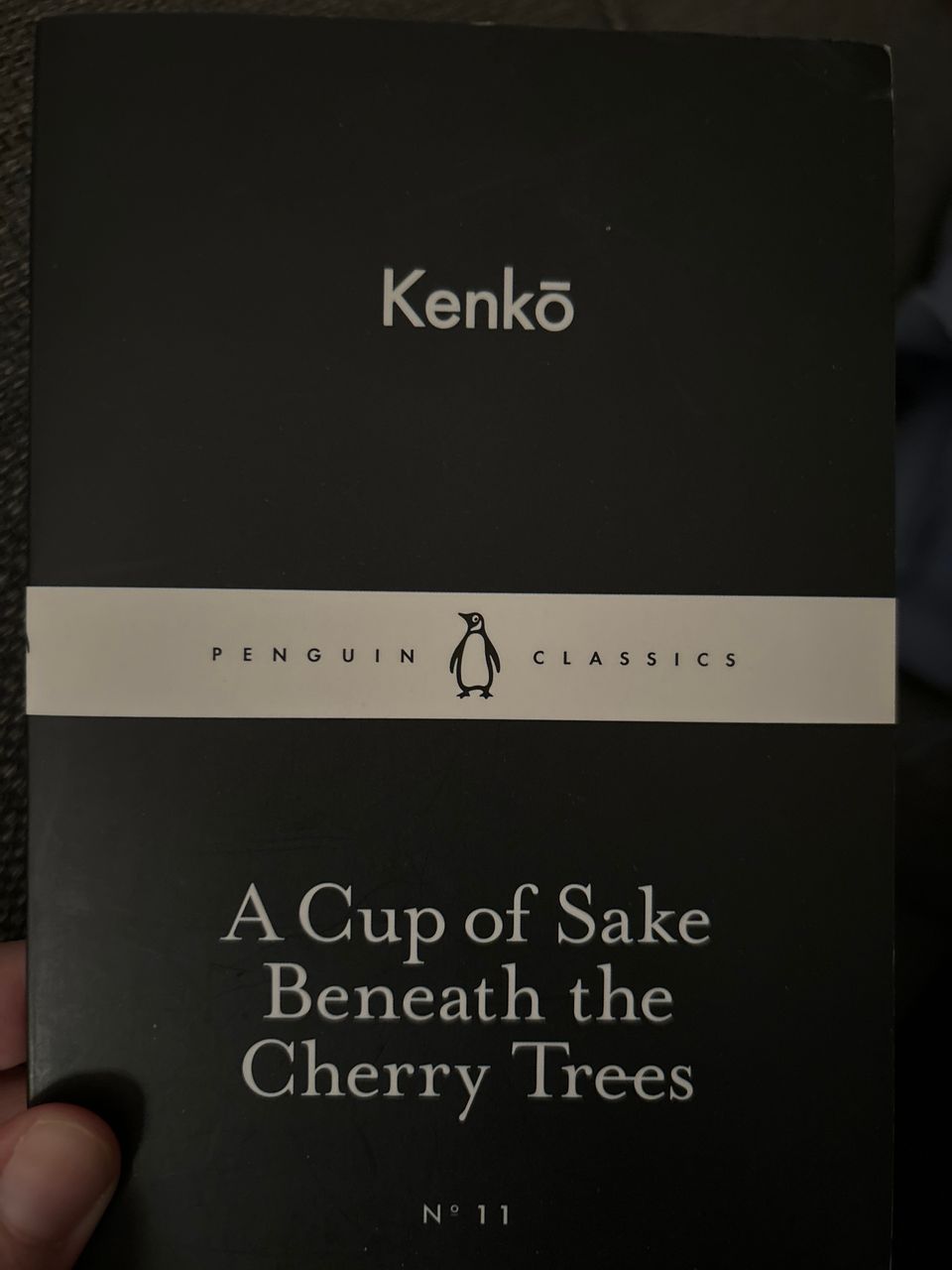 Kenko - A cup of sake beneath the cherry trees