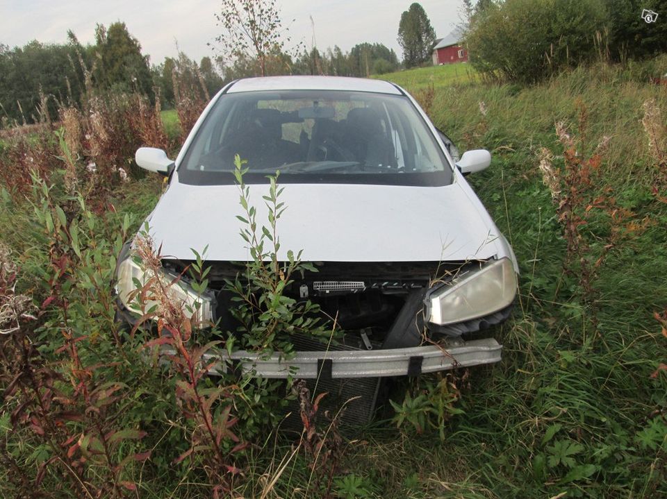 Renault Megane 1.6 -05 Osina