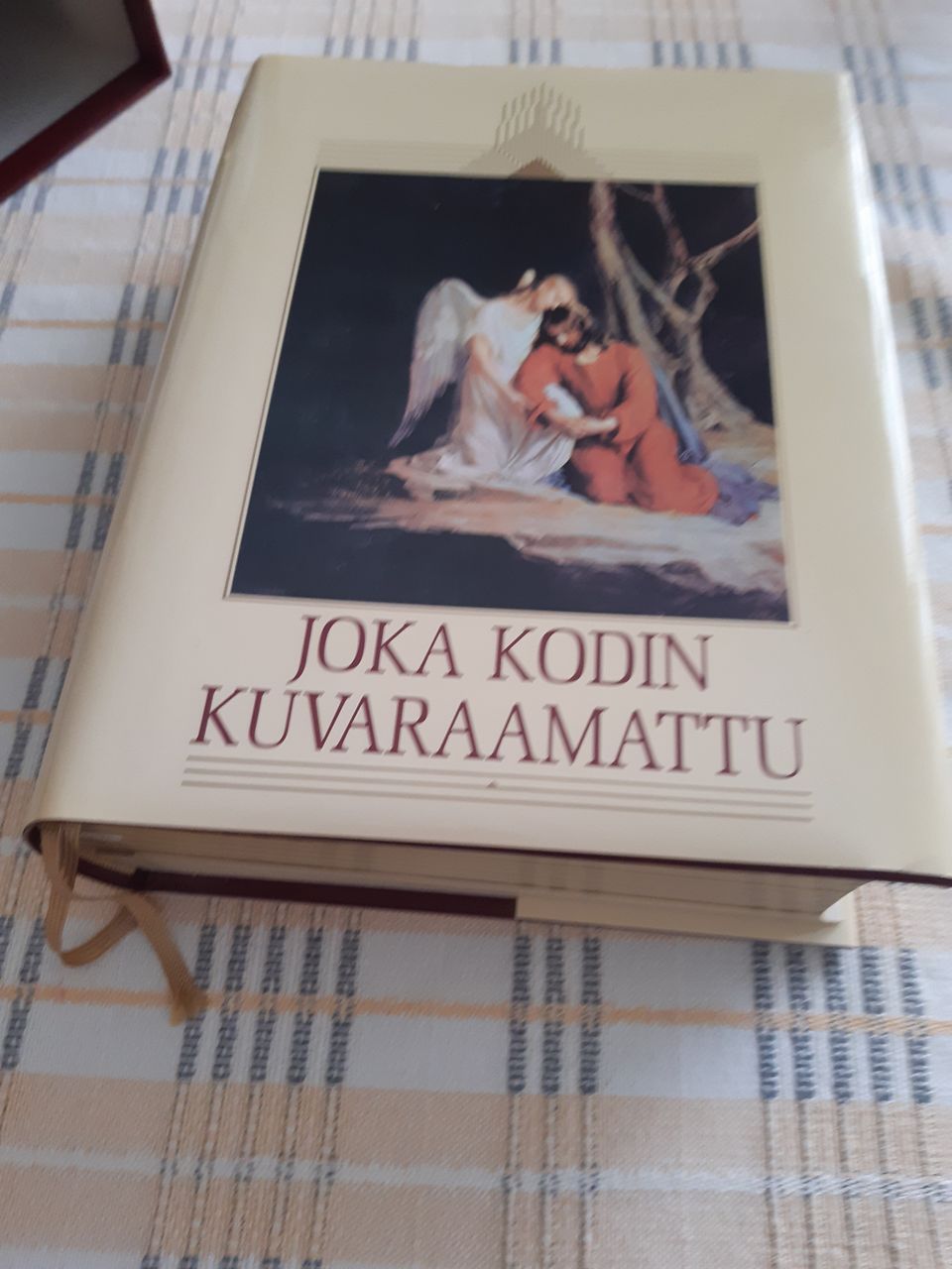 Joka kodin kuvaraamattu