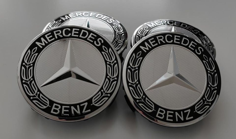 Mercedes-Benz uudet vannekeskiöt 4kpl, kromi mustalla kehällä