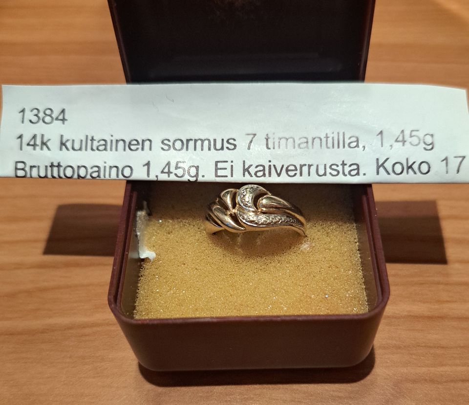 14 k sormus 7 timantilla