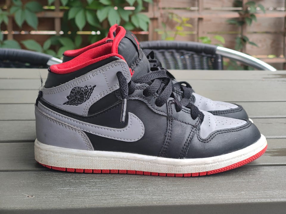 Nike Air Jordan 1 Mid “Bred Toe” The Air Jordan 1 Mid Cleat TD Bred Toe is Available Now