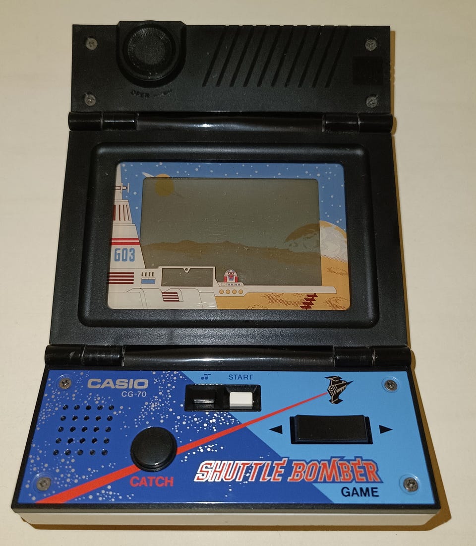 Casio CG-70 Shuttle Bomber - elektroninen videopeli ja radio | Tori