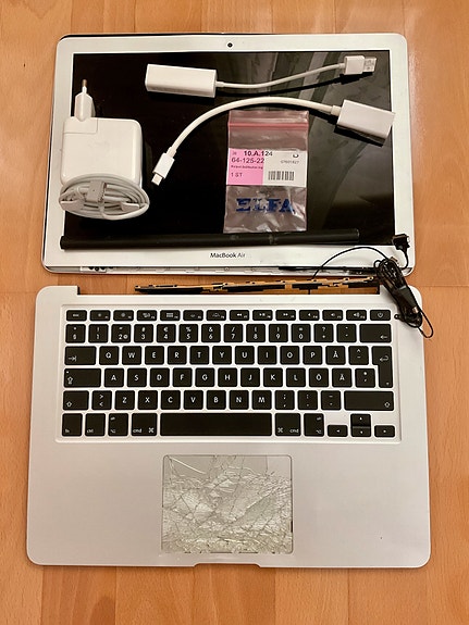 Apple Magsafe-laturi + adapterit