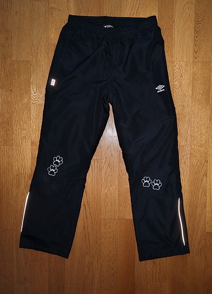Umbro tuulihousut 140