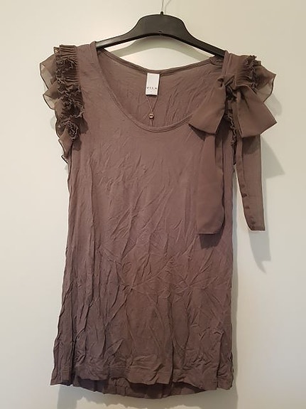 Juhlava toppi upea rusetti