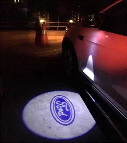 Ford Focus (MK4/C519) sivupeilien projektorivalot — logo maahan (2kpl)