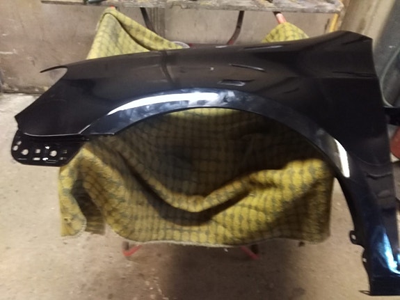 VW Golf etulokasuoja vasen v 2009-2013