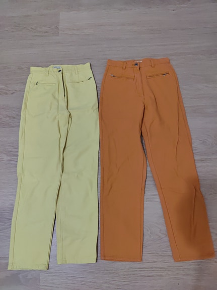 Oranssit ja keltaiset housut 36