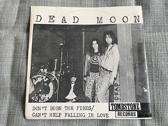 Dead Moon – Don't Burn The Fires / Can't Help Falling In Love 7" single