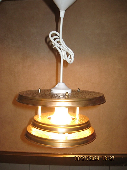 Design: Kattovalaisin  kuparia