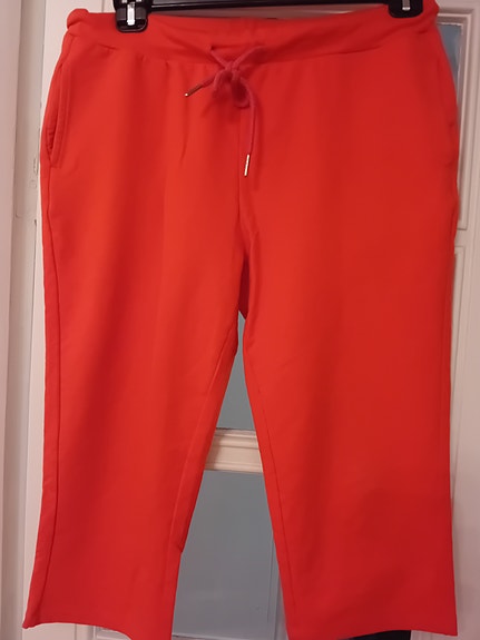 Tumman oranssit kapri housut, M