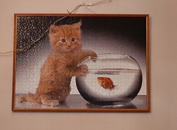 Kissa palapelitaulu.