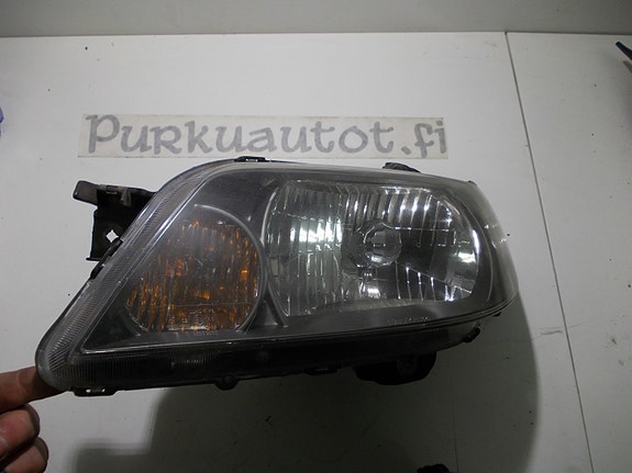 Mazda 323f hatchback ajovalo vasen 2000