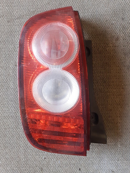 Nissan Micra K12 vasen takavaloumpio