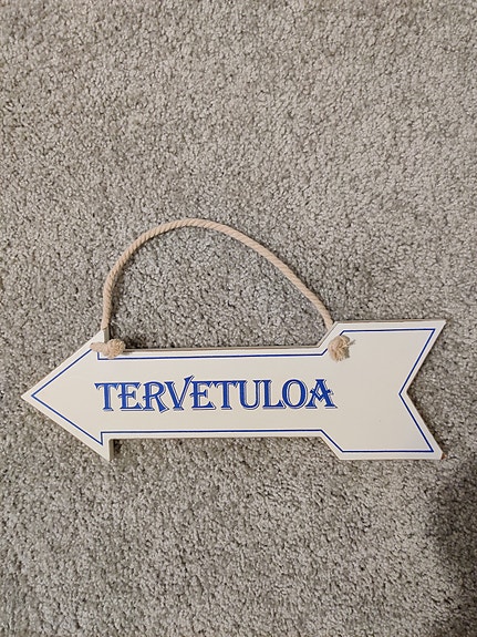 Tervetuloa kyltti