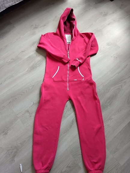 Tyttöjen pinkki jumpsuit