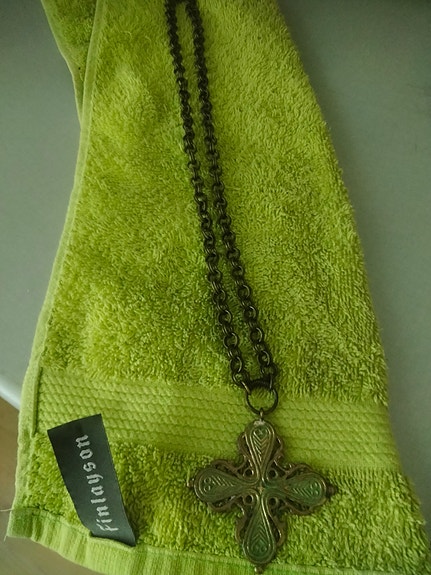 Räisälän risti, pronssi. Kalevala.