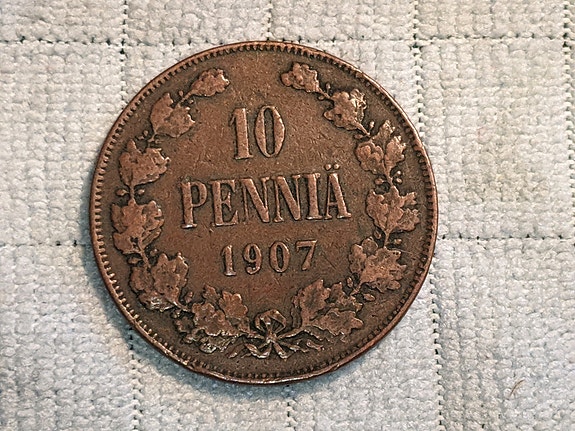 10 pennin keräilykolikko,