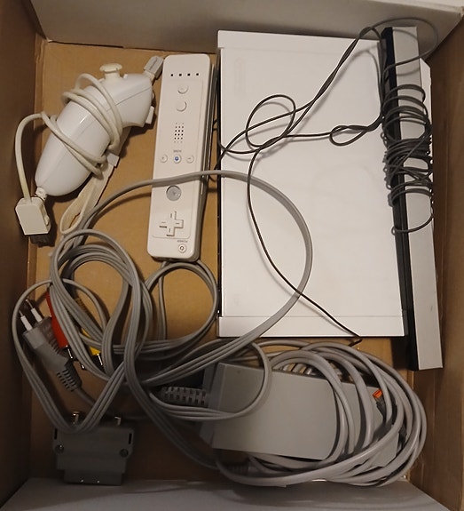 Wii konsoli +motionohjain/nunzka