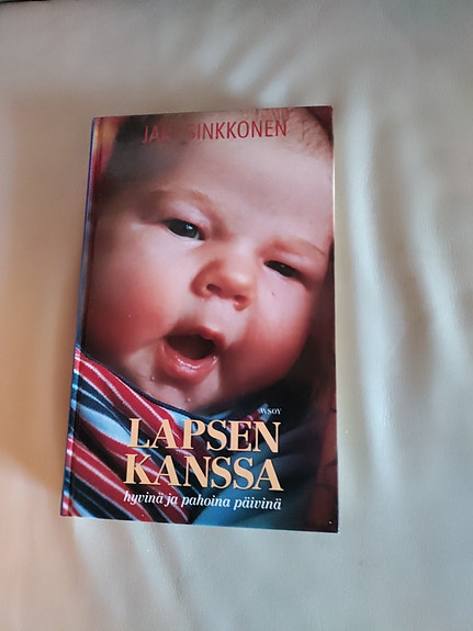 Jari Sinkkonen Lapsen kanssa