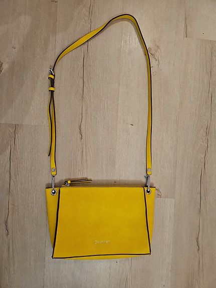 Calvin Klein keltainen UUSI laukku