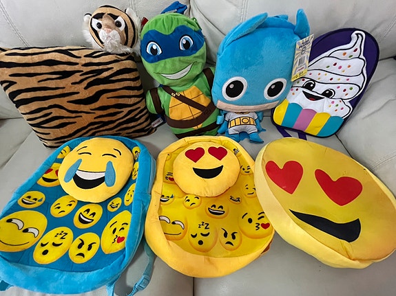 Figure backpack 6pcs and one tiger pillow all brand New