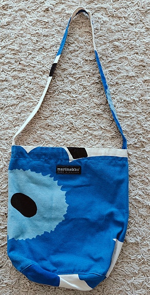 Unikko laukku