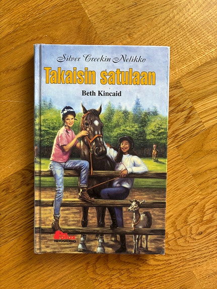 Takaisin satulaan kirja