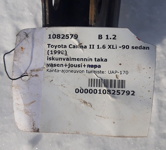 Toyota Carina II vasen takaiskari ja jousi.