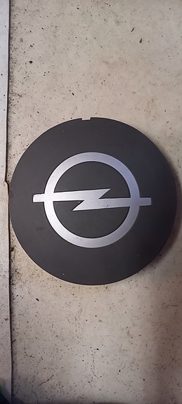 Opel pölykapseli