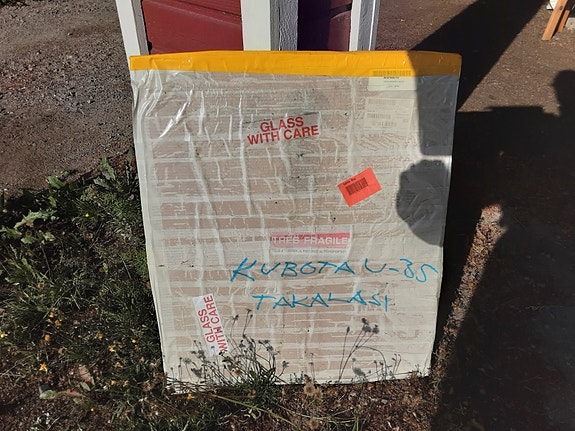 Kubota kaivinkoneen takalasi