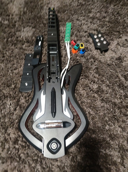 Guitar Hero Warriors of Rock kitara osina