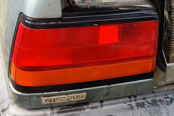 Nissan N13 sedan vasen takavalo
