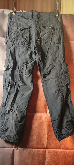 Mustat tyttöjen vuorelliset housut koko 134 cm