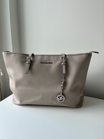 Michael Kors vaalea nahkainen laukku