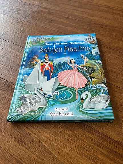 Satujen maailma kirja