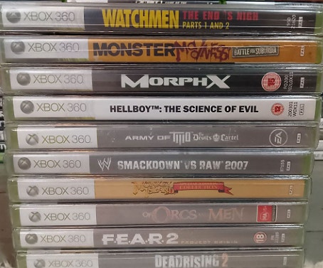 Uusia Xbox 360 pelejä avaamattomissa muoveissa
