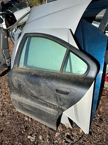 Volvo S60 vasen takaovi