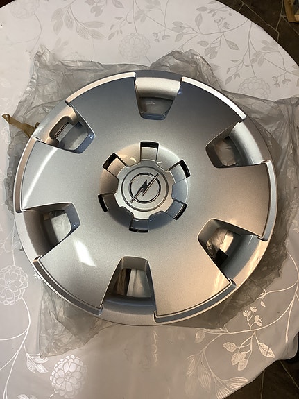 13209732 Pölykapseli Opel Astra H,Zafira B 16”